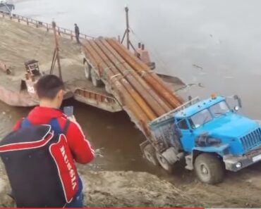 Truck Goes For A Swim After Trying To Get It On A Barge!