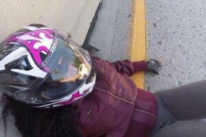 A girl on a Harley  Davidson Sportster Iron 883 Crashes at the South 405 Highway