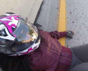 A girl on a Harley  Davidson Sportster Iron 883 Crashes at the South 405 Highway