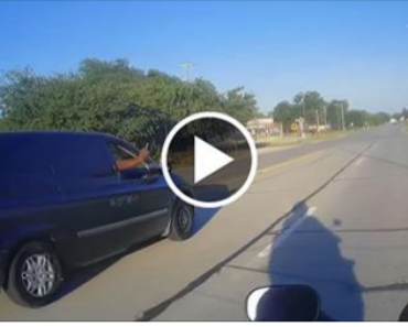 Road Raging motorcycle rider pegs minivan with a Rock!