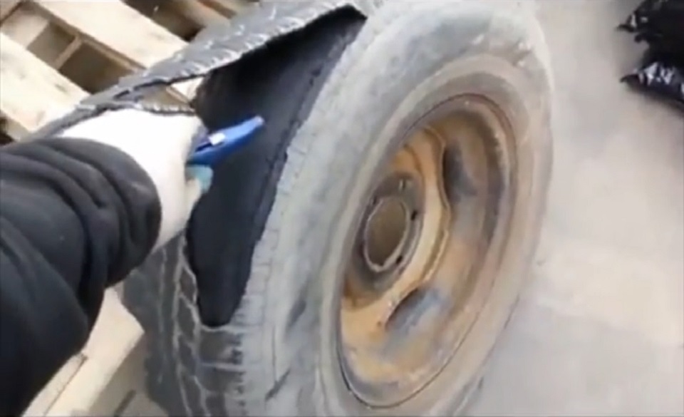 Worlds-Dumbest-Man-Almost-Kills-Himself-With-A-Tire-960x585
