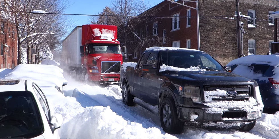 Ford F-150 rescues stuck semi in snowbound Chicago