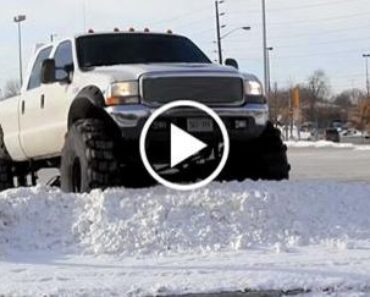 Ford F350 Truck on HUGE 54 Inch Tires Takes on the Snow!