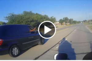 Road Raging motorcycle rider pegs minivan with a Rock!