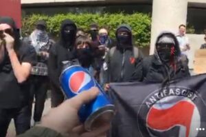 Someone Hilariously Tried To Break Up A Violent Riot With Pepsi!